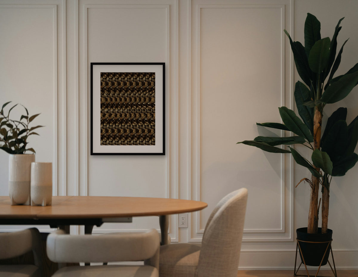 Custom hidden message print with a heart and initials J + M, framed in a dining room